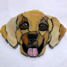 Mosaic of a puppy named Golden