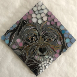 Mosaic of a Gray and Brown Puppy