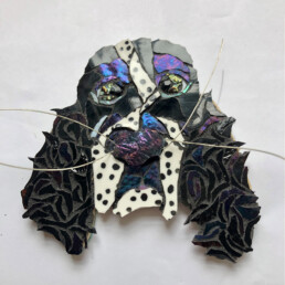 Mosaic of a puppy named Spaniel